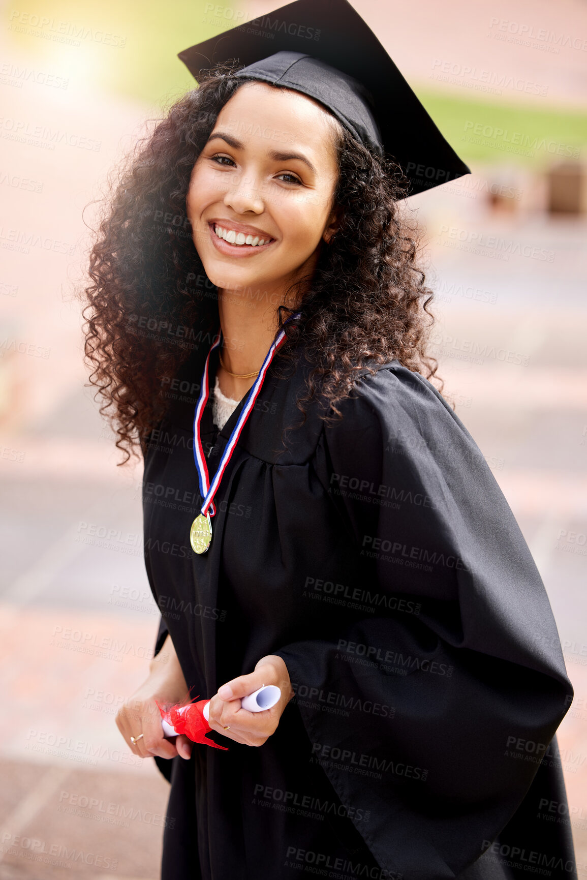 Buy stock photo Woman, graduation and celebrate with medal and portrait, diploma and happy student for university. Prize, scholar and robe with mortar for degree, achievement and female person with certificate