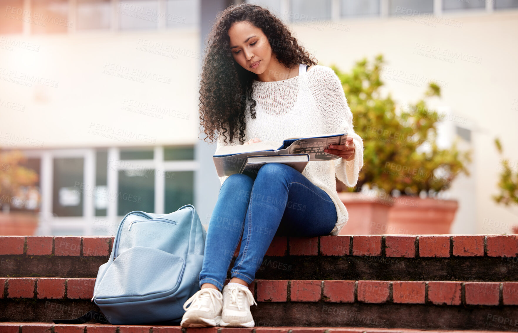 Buy stock photo Shot of a young woman studying at college