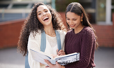 Buy stock photo Laugh, university and portrait of women with book on campus for learning, knowledge and studying. Education, friends and happy female students laugh with textbook for information, research or college