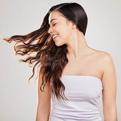 Buy stock photo Studio shot of a young woman with beautiful long hair
