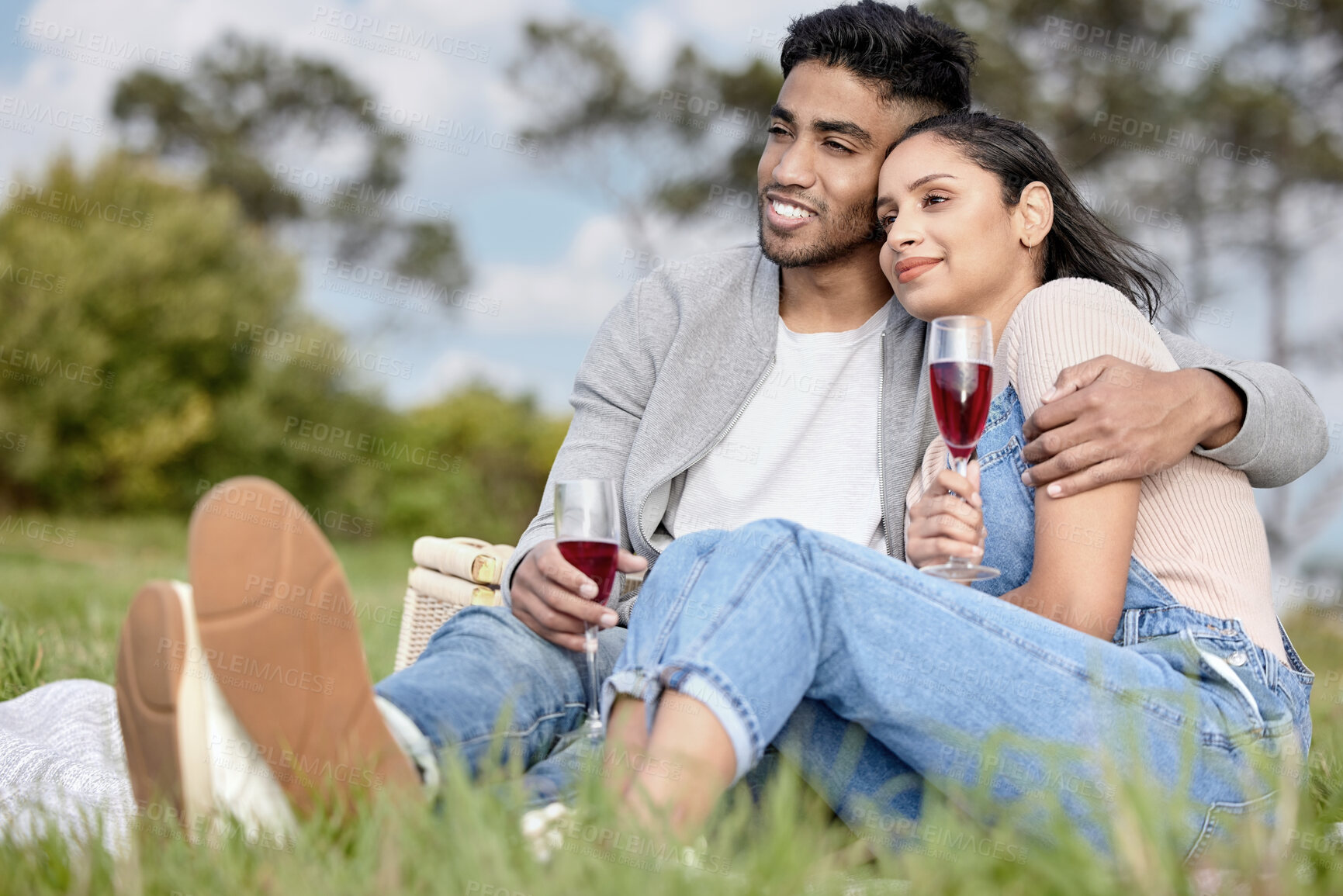 Buy stock photo Man, woman and love in nature for date, picnic and champagne for relax in field. Couple, happiness and romantic in park for celebration, anniversary and vacation or travel to countryside together