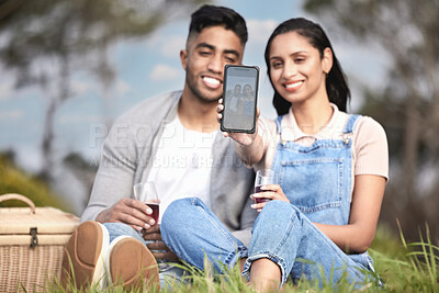 Buy stock photo Happy, couple or picnic selfie outdoor in park for romantic date, love or celebration together with drinks. People, man and woman smile in nature for bonding, relationship and calm day with wine