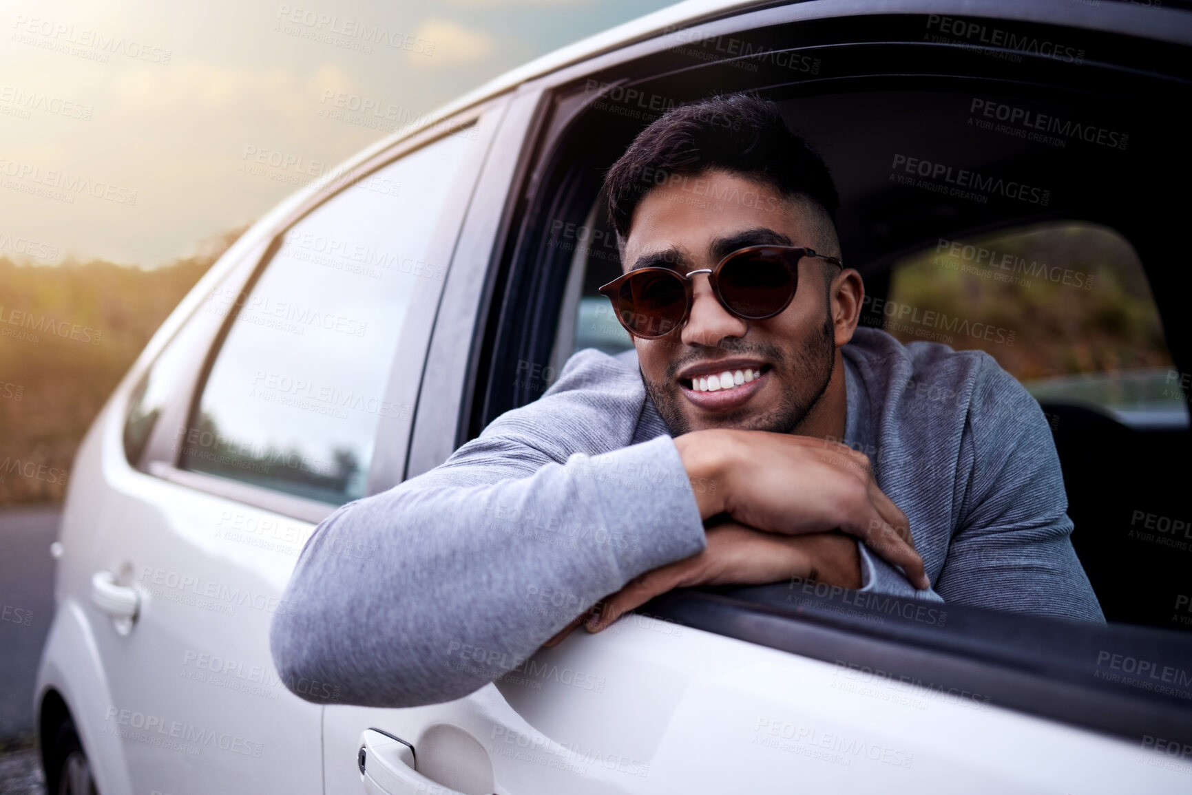 Buy stock photo Happy, adventure and man in car window with smile for travel or road trip with relaxing journey in summer. Break, transport and holiday or vacation to Sweden with ride in countryside for view.