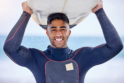 Buy stock photo Man, portrait and surfboard on head at beach, workout and training for water sports competition. Male person, health and travel to ocean or sea for wave, fitness and athlete for exercise in nature