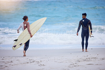 Buy stock photo Beach, water and friends walking with surfboard for summer sports, fun and bonding on adventure in nature. Surf, travel and back of surfer couple at sea for ocean, freedom or vacation in California