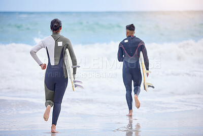 Buy stock photo Surfing, running and couple at beach for exercise, training and healthy body on summer holiday vacation together. Surfboard, man and woman at ocean for fitness, travel or back view by water at sea