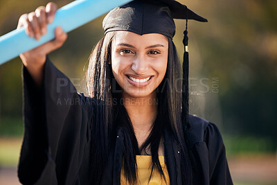 Buy stock photo Graduation, confident and portrait of woman with scroll on university campus for education achievement. Happy, future and student graduate with college diploma, degree or certificate to celebrate.