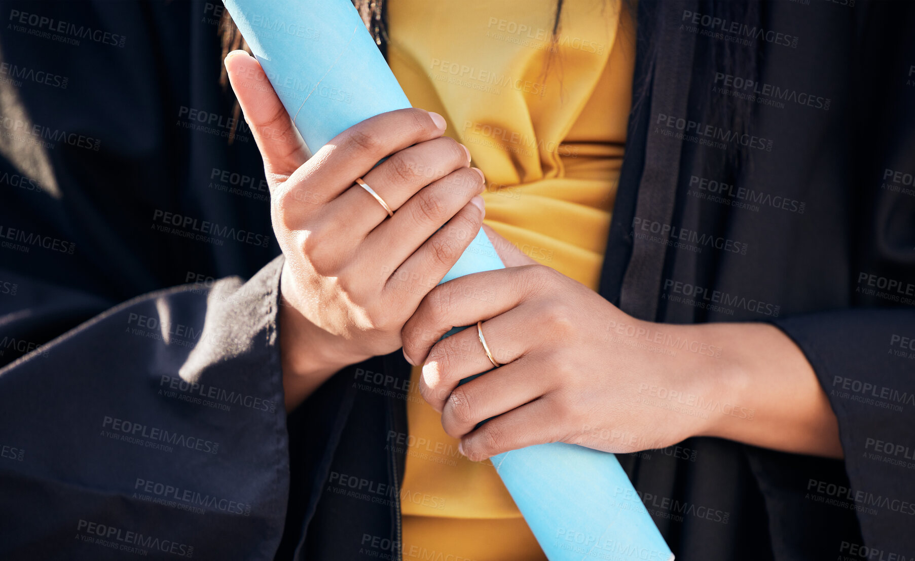 Buy stock photo Graduation, hands and woman with degree scroll on university campus for education achievement. Award, future and female student graduate with college diploma or certificate to celebrate at school.