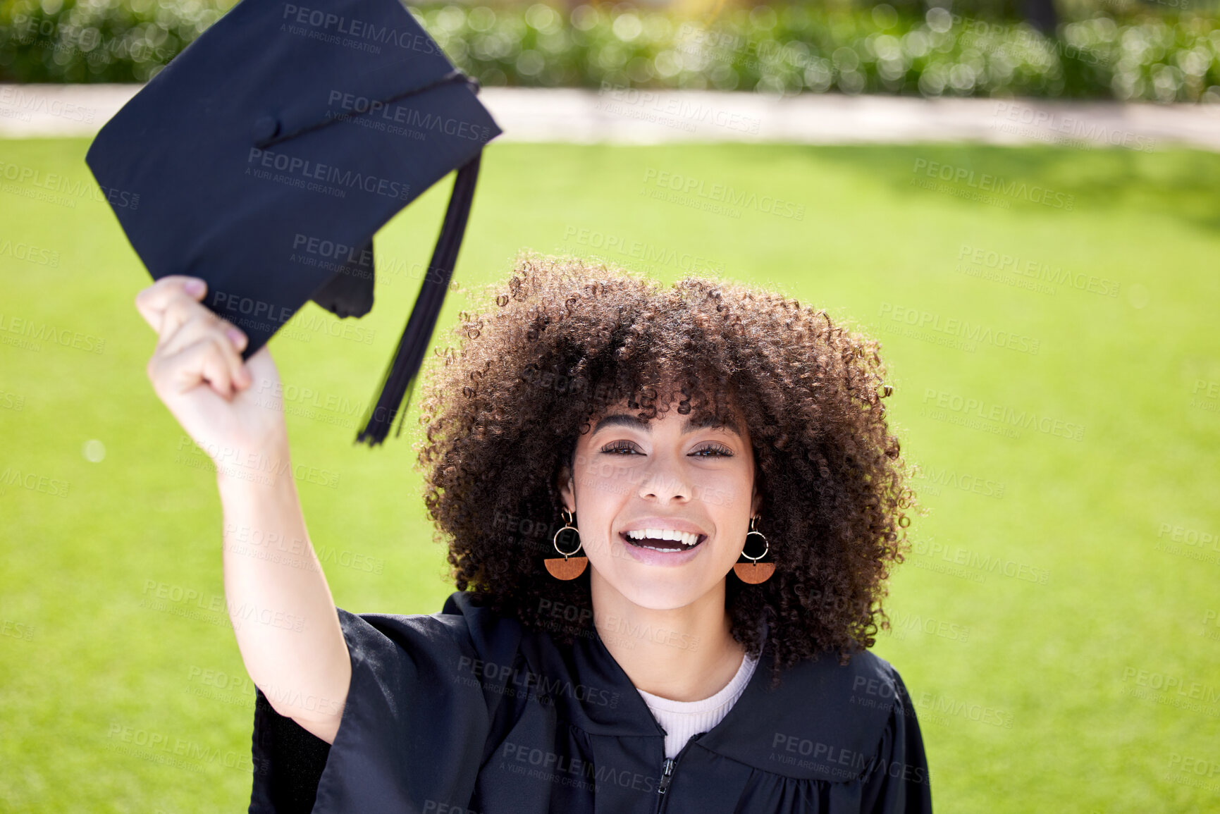 Buy stock photo Woman, happy in portrait with graduation cap and success, education qualification and achievement with happiness. Certificate, degree and diploma with female graduate smile, celebration and college