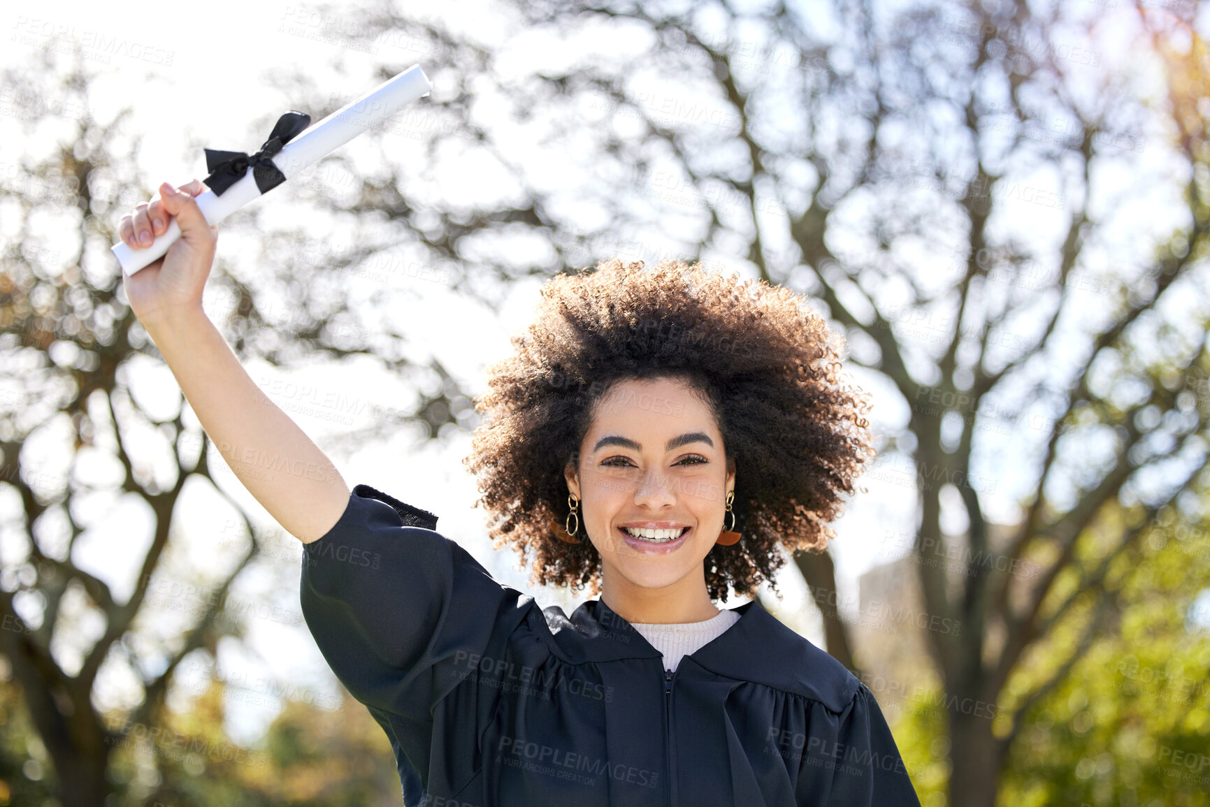 Buy stock photo Graduation, portrait and happy woman with diploma outdoor for achievement, success or celebrate at college campus. Face, student and graduate with certificate scroll at garden for education in Brazil