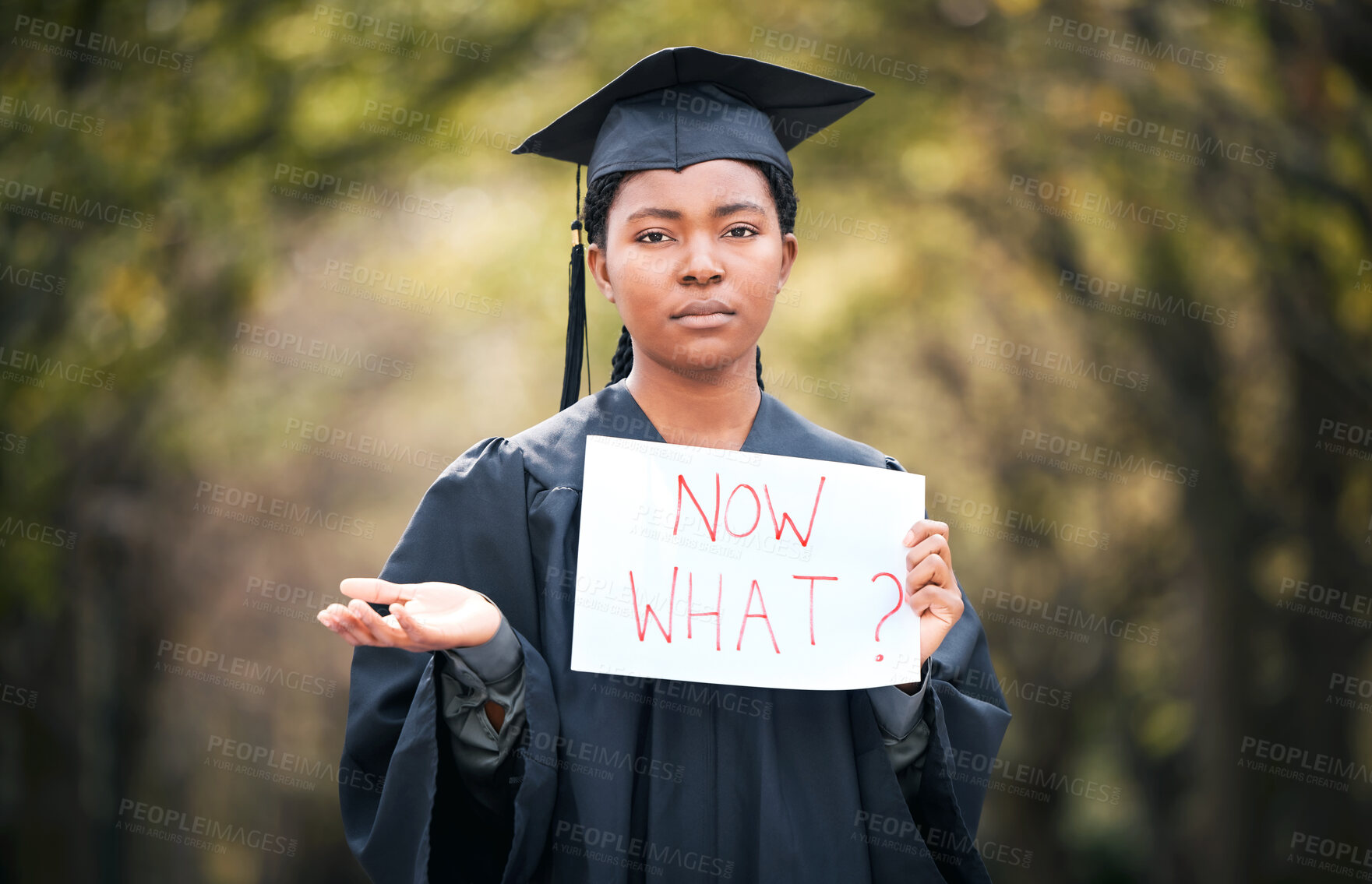 Buy stock photo Portrait, graduation and poster with a confused black woman student outdoor at a university event. Doubt, question and a female college graduate standing on campus asking what now after scholarship