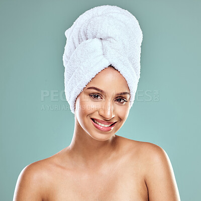 Buy stock photo Shot of a beautiful young woman posing against a studio background