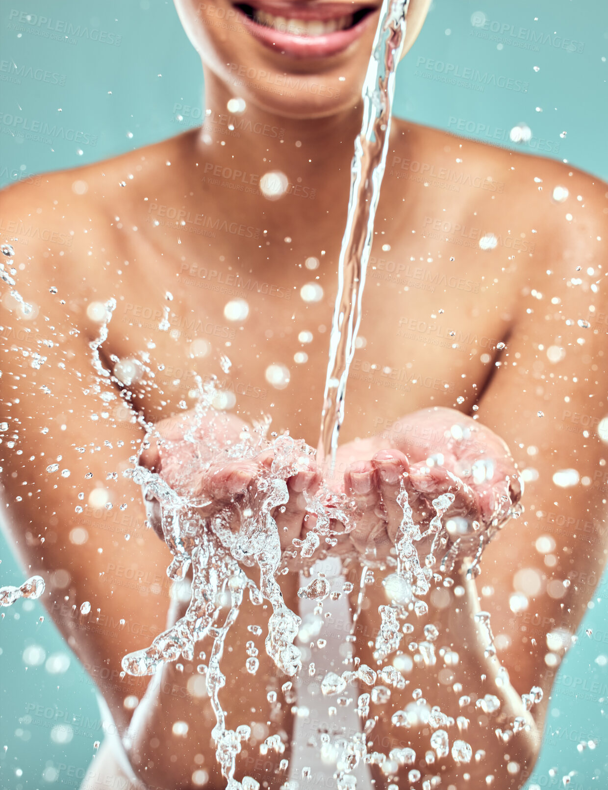 Buy stock photo Hands, woman and water splash in studio for hygiene, cleaning and happiness for skincare. Model girl, smile and wellness in bathroom for morning, facial and dermatology with liquid for glow and bath 