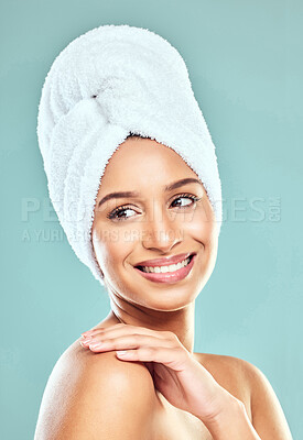 Buy stock photo Shot of a beautiful young woman posing against a studio background