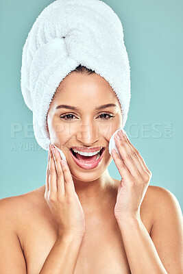 Buy stock photo Portrait, towel and woman for skincare or cleansing, cotton pads and pamper for blue background. Cosmetology, smile or hygiene routine for spot control, retinol or hyaluronic acid for female person