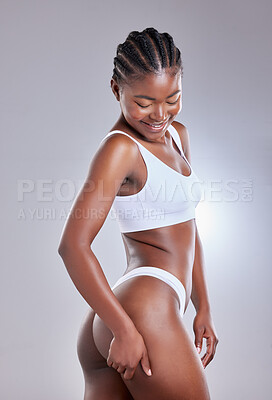 Buy stock photo Black woman, smile and butt in studio for underwear, wellness and beauty model aesthetic. Girl, happy and ass for lingerie, transformation or fitness with natural body confidence on white background