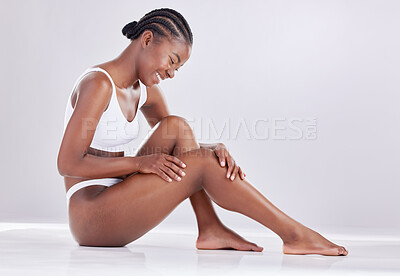 Buy stock photo Skincare, wellness and black woman on studio floor for shaving, grooming and hair removal. Beauty, underwear and female person on white background for epilation cosmetics, natural skin or body care