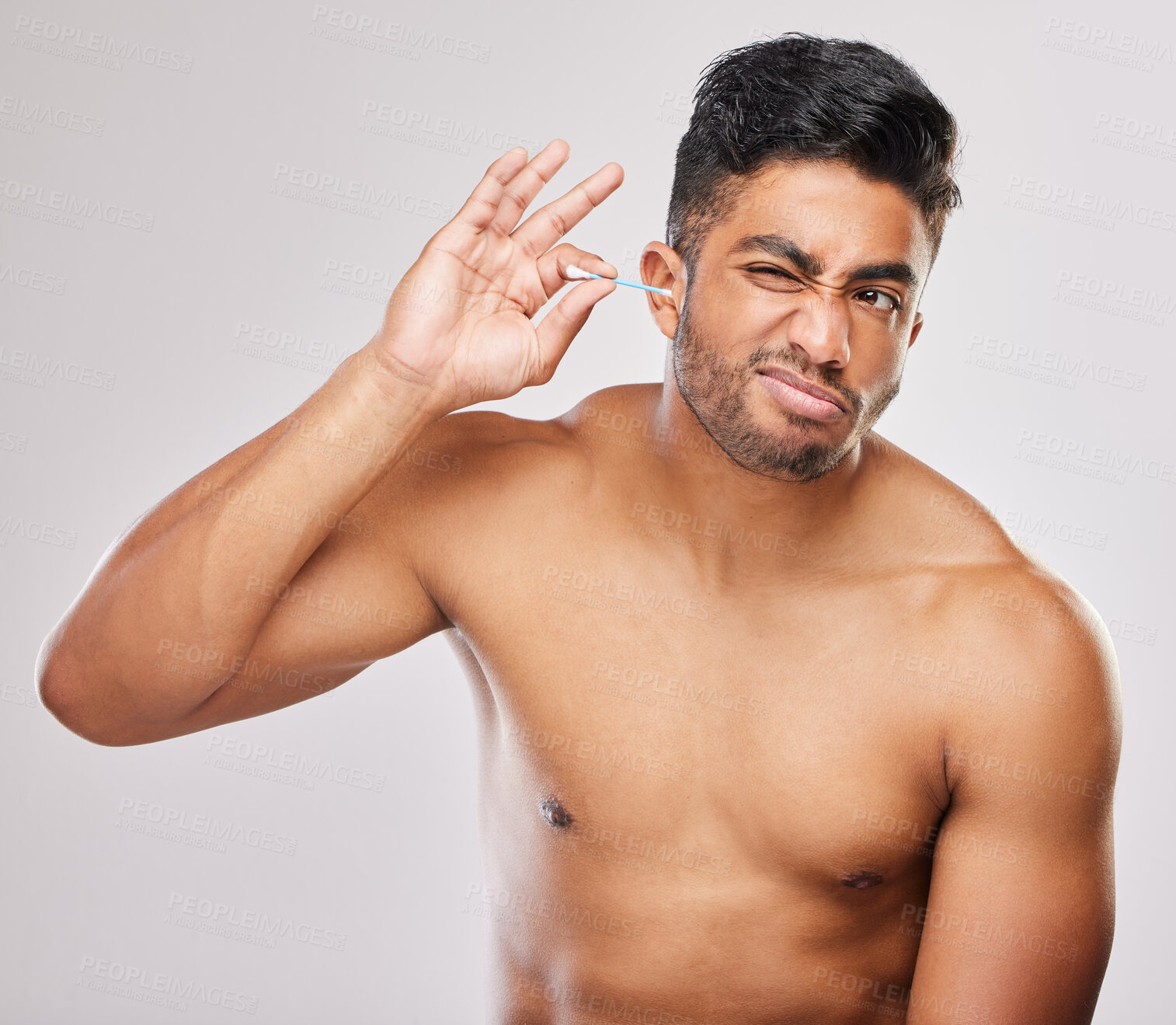 Buy stock photo Man, cotton swab and ear with cleaning in morning for grooming or health on white background. Skincare, cosmetics and hygiene for self love with wellness or routine with treatment for hearing.