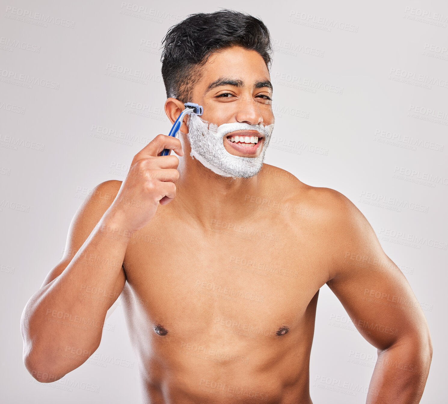 Buy stock photo Grooming, man and shaving in morning, routine and wellness in body care, hygiene and grey background. Male person, cosmetics and fresh for confidence, masculine and fragrance with product in studio