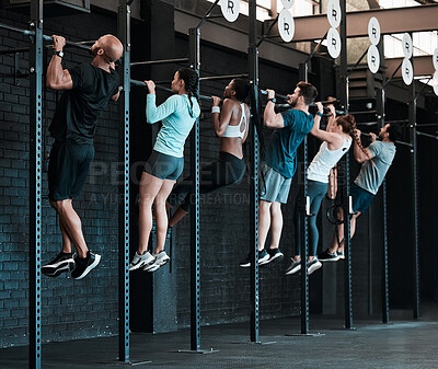 Buy stock photo People, group and exercise with pull ups, training and endurance with fitness, workout goal and motivation. Athletes, men and women with wellness, sports and healthy in a gym, dedication and strength