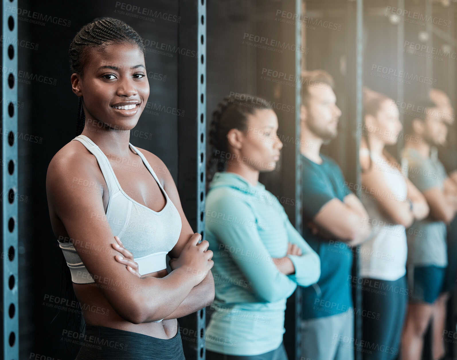 Buy stock photo Fitness, woman and confident in row for portrait, exercise and healthy body in gym. Happy, athlete and arms crossed with team for challenge, competitive and ready for workout in wellness center