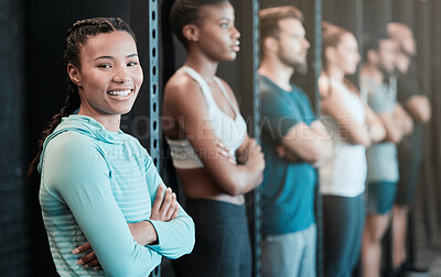 Buy stock photo Shot of a young woman happily waiting with her friends to workout