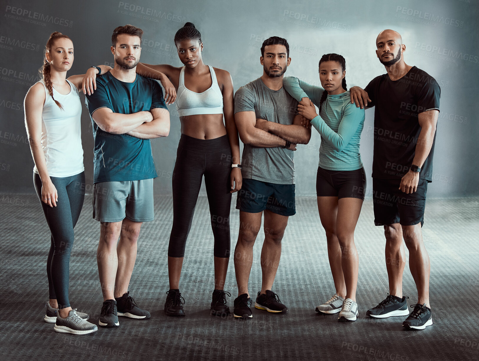 Buy stock photo Shot of a group of workout partners together at the gym