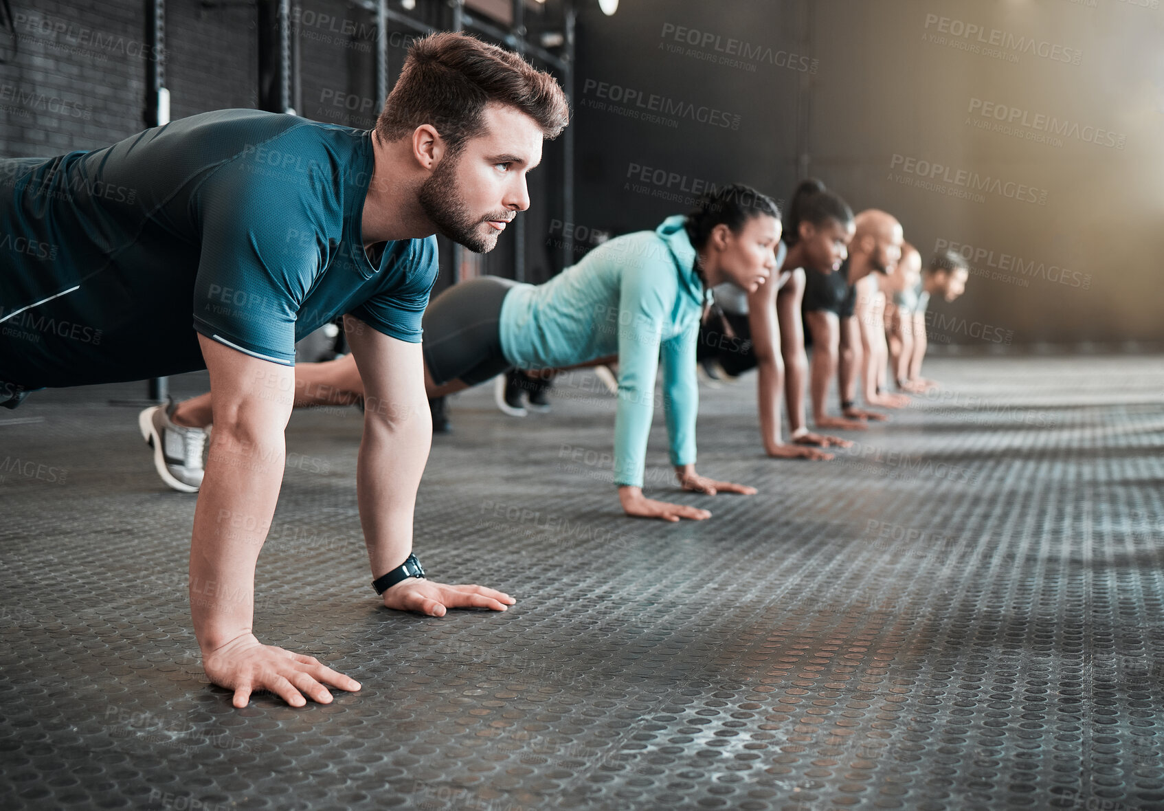 Buy stock photo Shot of a group of friends planking together