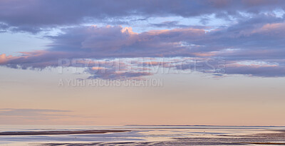 Buy stock photo Copy space, sea and ocean view with sunset sky and stratocumulus clouds over calm, serene or peaceful beach. Relaxing, tropical and remote seascape with copyspace on private coastal island at sunrise