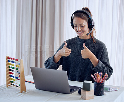 Buy stock photo Shot of a young teaching an online lesson with her laptop at home