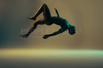 Buy stock photo Shadow, black man and nude model in a studio background for creative art with lights. Isolated, floating and young naked body of a african person in the air with light showing dark art deco glow