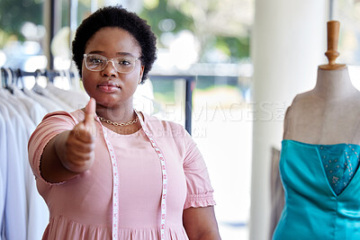 Buy stock photo Portrait, seamstress and black woman with thumbs up, support and review with startup, skills and promotion. African person, face or entrepreneur with hand gesture, thank you and icon for like or sign