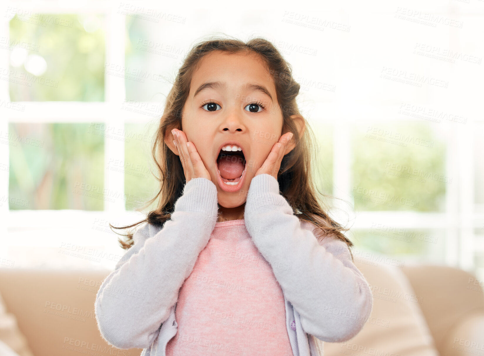 Buy stock photo Shock, portrait and child in living room, home and reaction for announcement of win in competition. House, surprised and expression for excitement, wow and student with achievement and notification