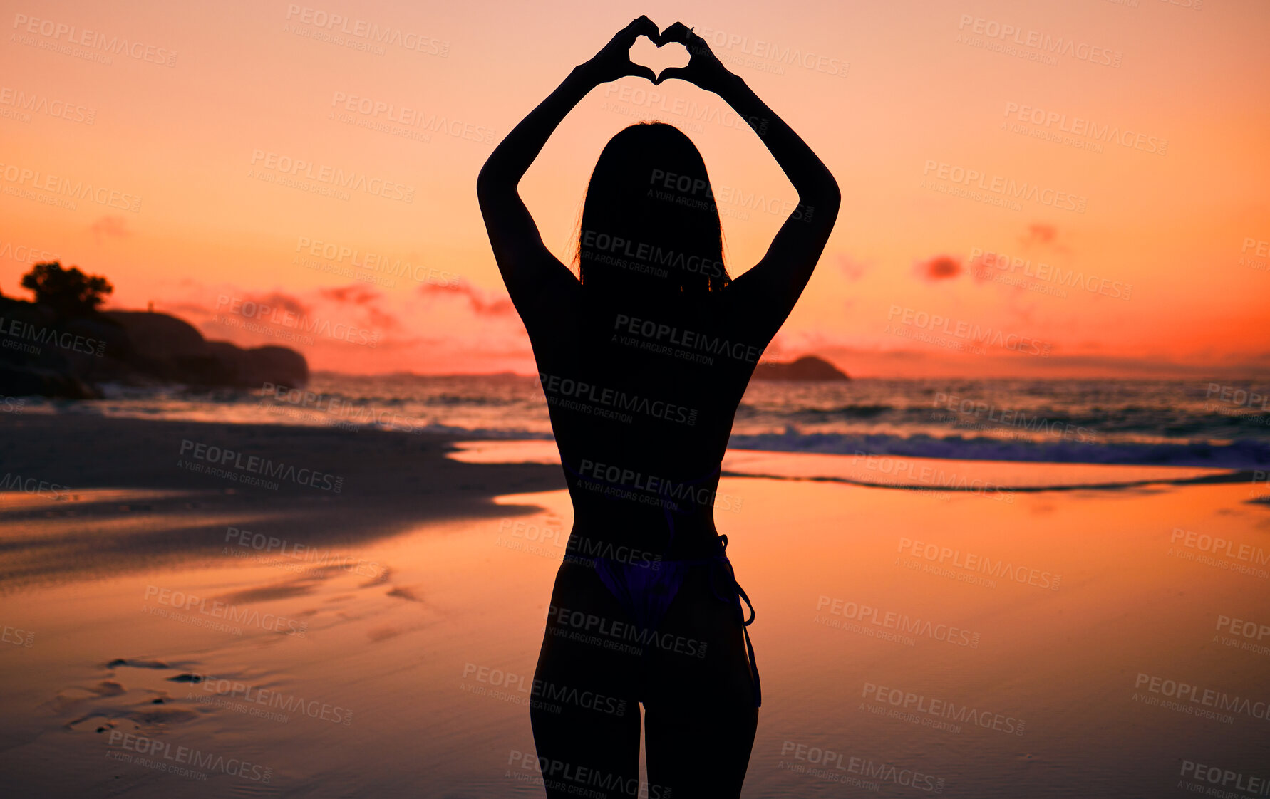 Buy stock photo Woman, silhouette and sunset by water with heart hands for love, care and kindness with sign, summer and body. Girl, person and beach with symbol, emoji or icon on vacation, ocean or outdoor at dusk