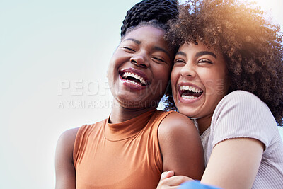 Buy stock photo Couple of friends, black women and hug outdoor while laughing with freedom, happiness and lgbtq love. Face of happy, lesbian and african people together for space in sky or funny adventure in London