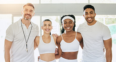 Buy stock photo Cropped portrait of three young tennis players and their coach standing in the clubhouse