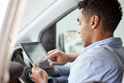 Buy stock photo Tablet, navigation and a man driving a car while searching online for directions to a location as a driver. Map, technology and app with a young male sitting in a vehicle for transport or travel