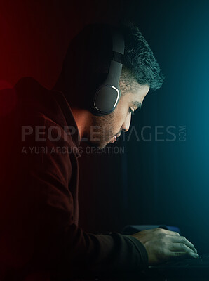 Buy stock photo Esports, man and gamer on computer at night for competition in rpg video games or virtual challenge. Gaming, nerd and hacker typing in dark for cyber contest in home with neon light or tech mockup