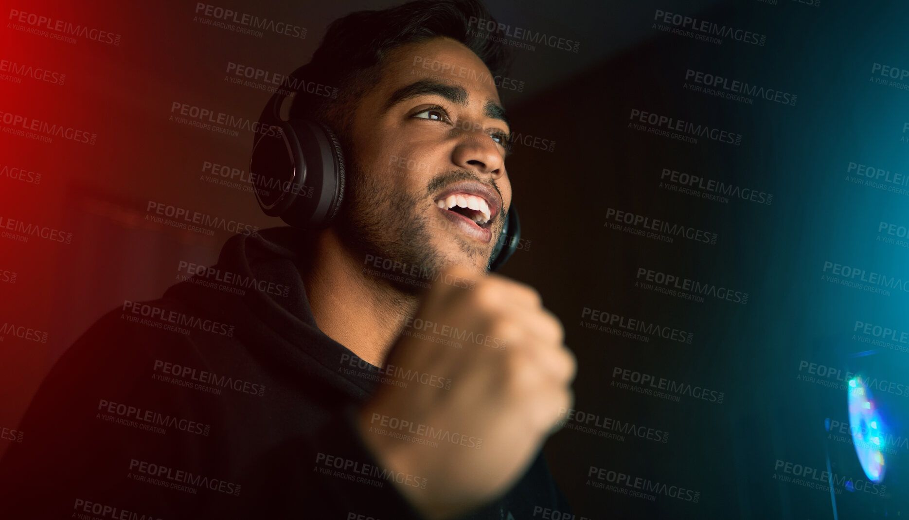Buy stock photo Man in dark room, video games and winning with fist pump, online streaming with gaming competition and esports. Neon lighting, cyber and male streamer celebrate win with gamer tournament and success