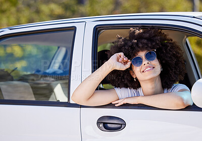 Buy stock photo Happy woman, portrait and car window with sunglasses on road trip, holiday or outdoor drive in nature. Female person with smile, afro or glasses in fashion for freedom, adventure or travel in vehicle