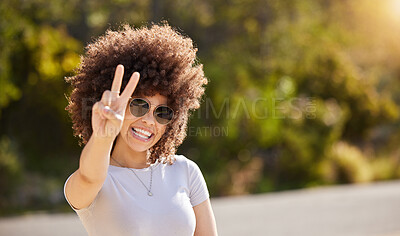 Buy stock photo Shot of a young woman out on a road trip