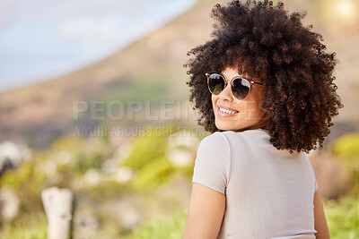 Buy stock photo Shot of a young woman out on a road trip