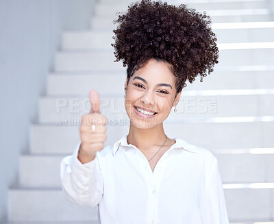 Buy stock photo Shot of a young businesswoman showing thumbs up