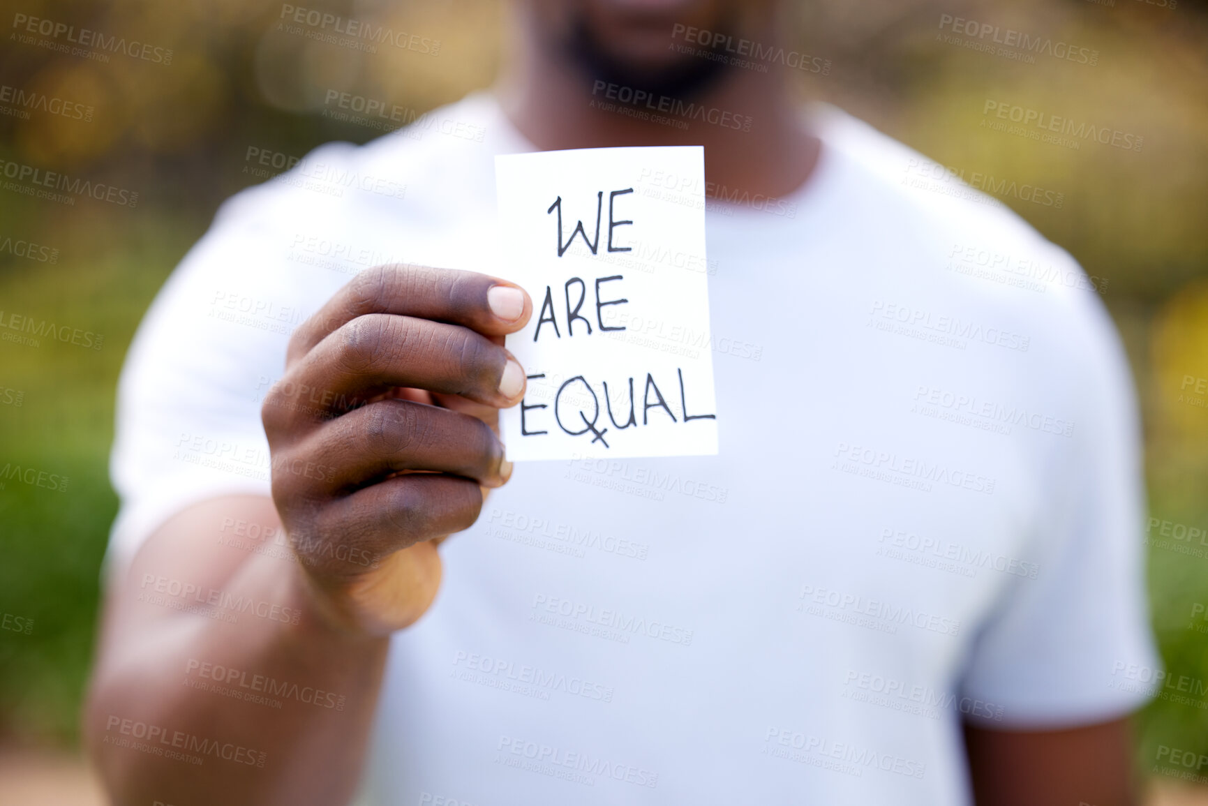 Buy stock photo Man, hand and card with message for protest, equality or human rights in outdoor nature. Closeup of male person or activist showing note for campaign, community or freedom in democracy or politics