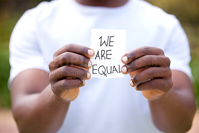 Buy stock photo Man, hands and card with message in protest, equality or human rights in outdoor nature. Closeup of male person or activist showing note on campaign, community or freedom in democracy or politics