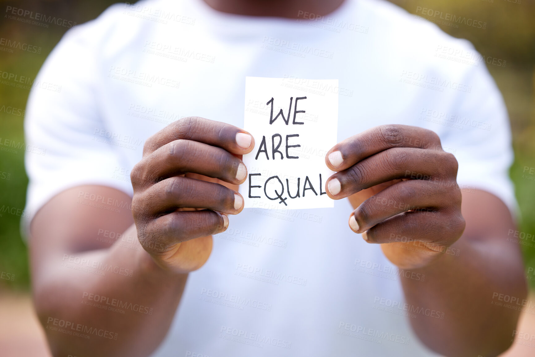 Buy stock photo Man, hands and card with message in protest, equality or human rights in outdoor nature. Closeup of male person or activist showing note on campaign, community or freedom in democracy or politics