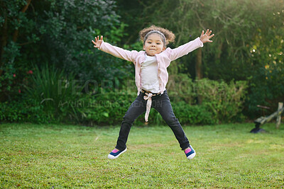 Buy stock photo Child, portrait and happy in garden, jumping and park for fun, joy and development as kid. Girl, person and positive in outdoor for growth, curiosity and weekend in playground for adventure as youth