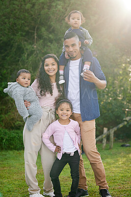 Buy stock photo Portrait, happy family and parents outdoor with children on vacation or holiday in garden together. People, mother and father with kids at park for support, piggyback and love with siblings in Brazil