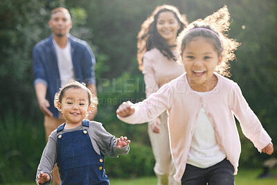 Buy stock photo Family, garden and kids running with parents and fun game with love, support and care outdoor. Lawn, backyard and nature with baby, mom and dad together with bonding and weekend activity on park walk