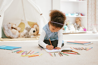 Buy stock photo Girl, book and drawing in house for development, learning and childhood growth with colorful pencils. Child, fun and games in home for coordination skills, creativity and preschool education on floor